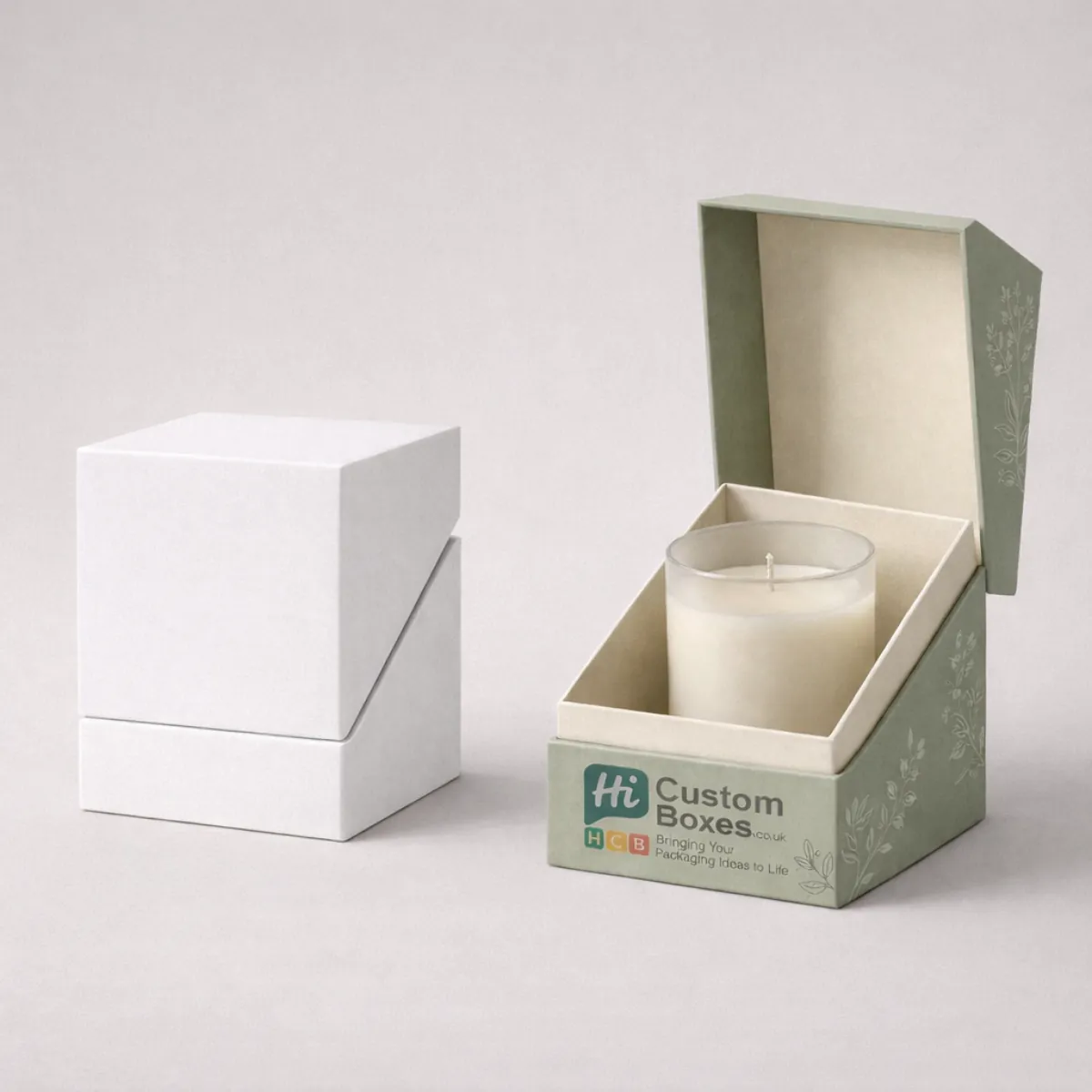 Sophisticated two-piece rigid boxes with a unique diagonal opening, revealing a scented candle in glass. class=
